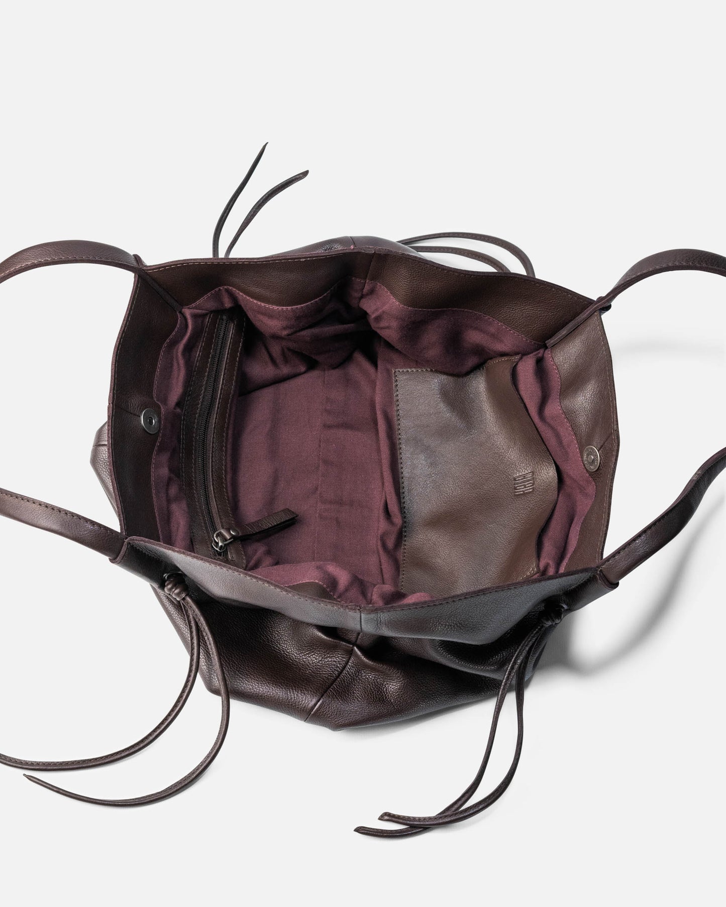 Brumley skulderveske – i aubergine skinn BIBA